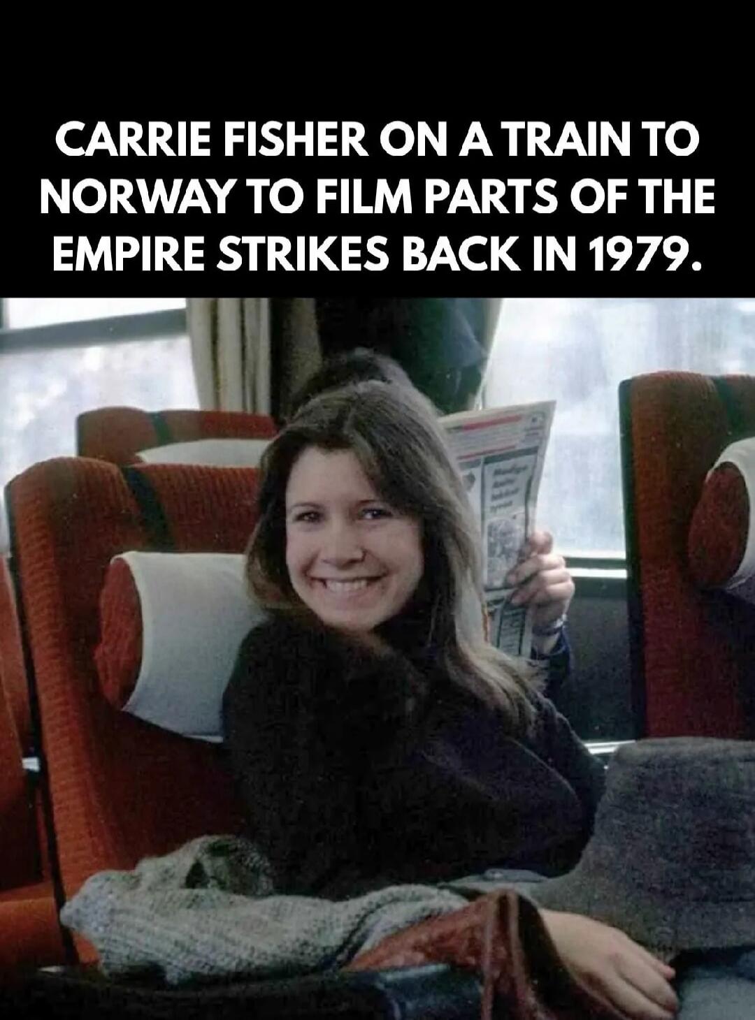 CARRIE FISHER ON A TRAIN TO NORWAY TO FILM PARTS OF THE EMPIRE STRIKES BACK IN 1979.