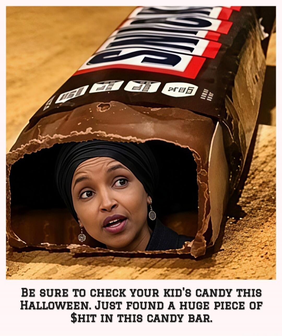SNICKERS. BE SURE TO CHECK YOUR KID'S CANDY THIS HALLOWEEN. JUST FOUND A HUGE PIECE OF $HIT IN THIS CANDY BAR.
