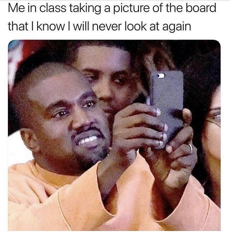 Me in class taking a picture of the board that know will never look at again