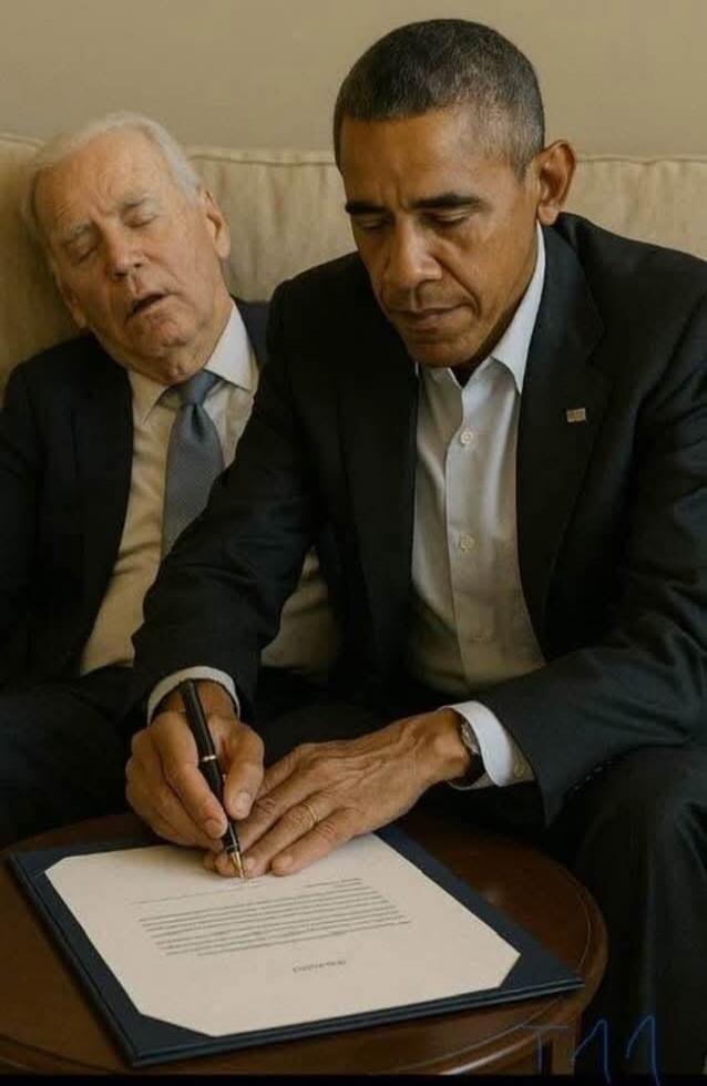 No speech detected. The image shows Barack Obama signing a document while Joe Biden appears to be asleep next to him.