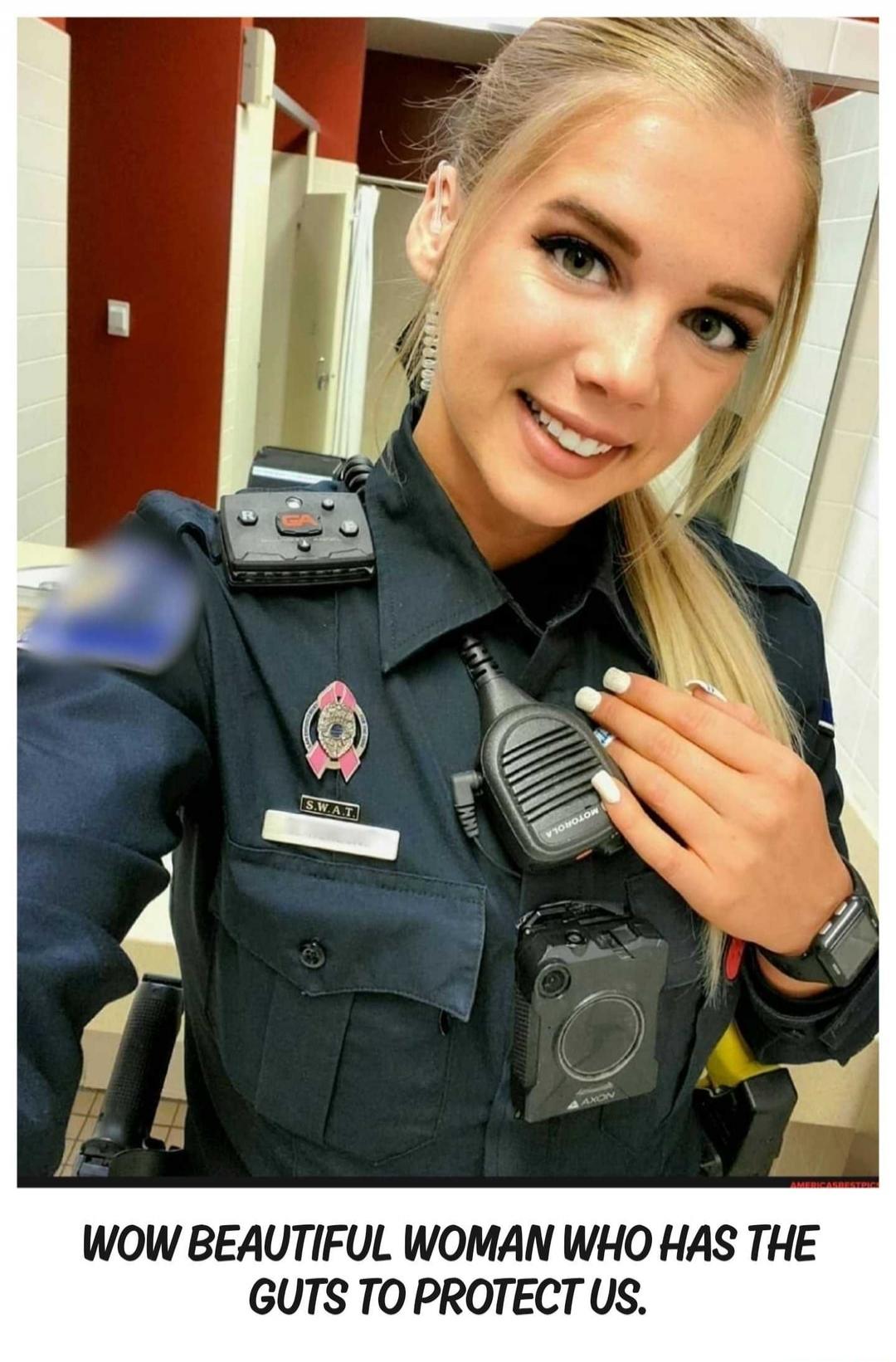 WOW BEAUTIFUL WOMAN WHO HAS THE GUTS TO PROTECT US.