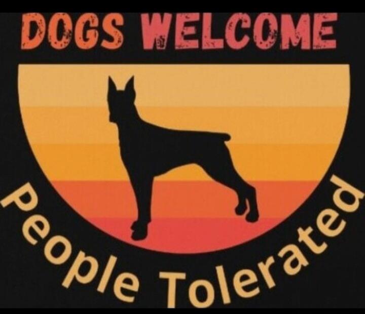DOGS WELCOME People Tolerated
