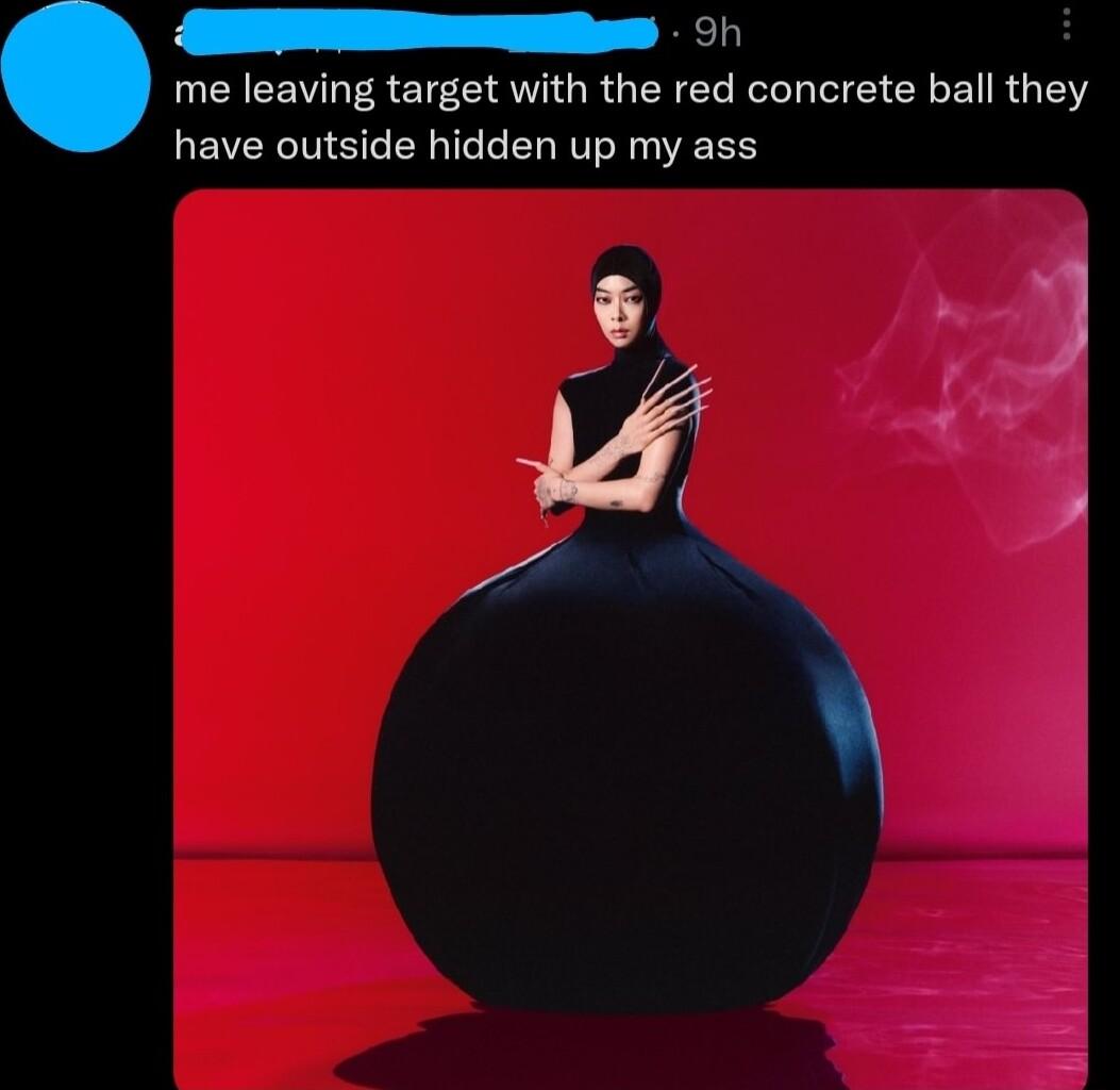 Ay me leaving target with the red concrete ball they have outside hidden up my ass