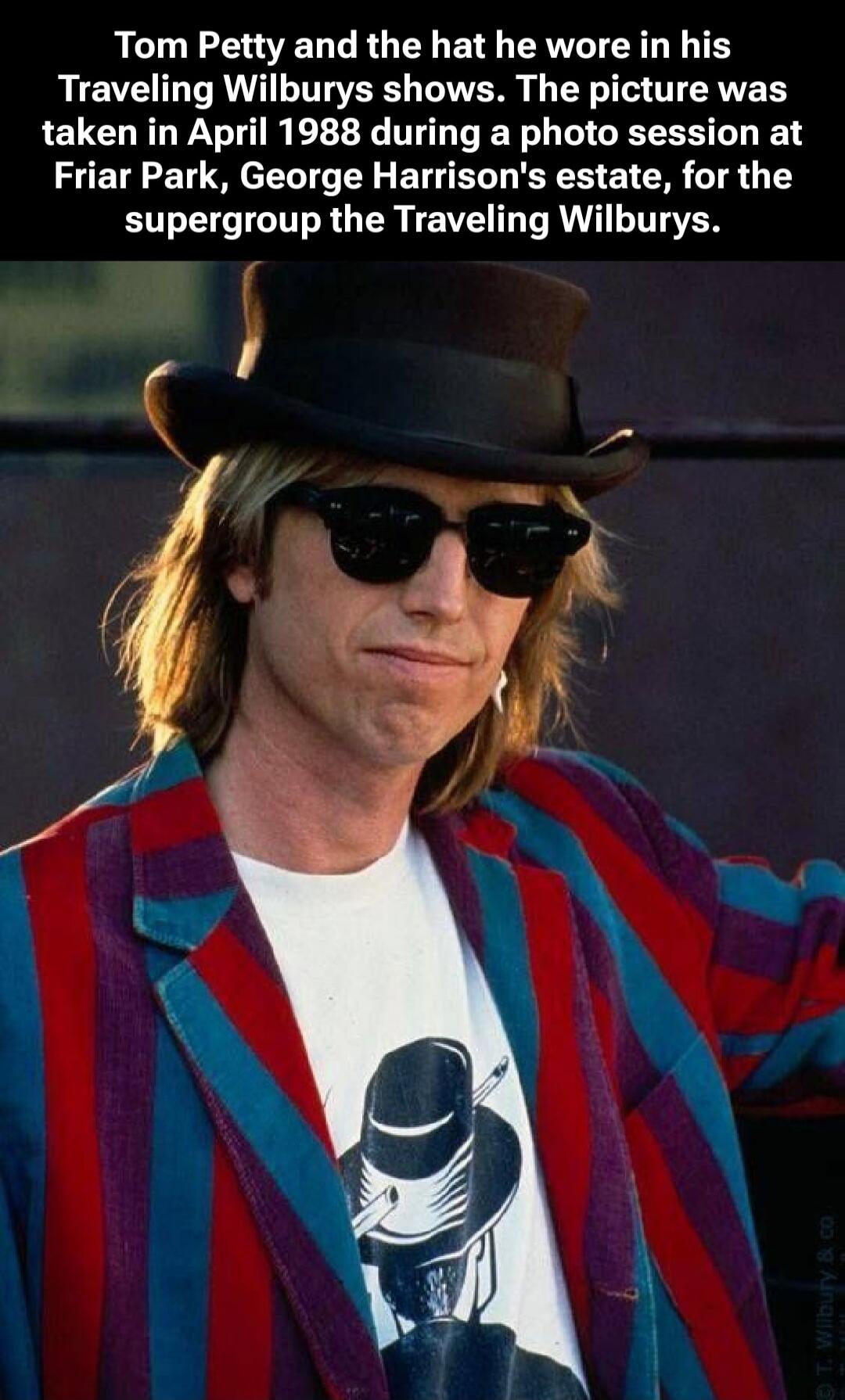 Tom Petty and the hat he wore in his Traveling Wilburys shows. The picture was taken in April 1988 during a photo session at Friar Park, George Harrison's estate, for the supergroup the Traveling Wilburys.