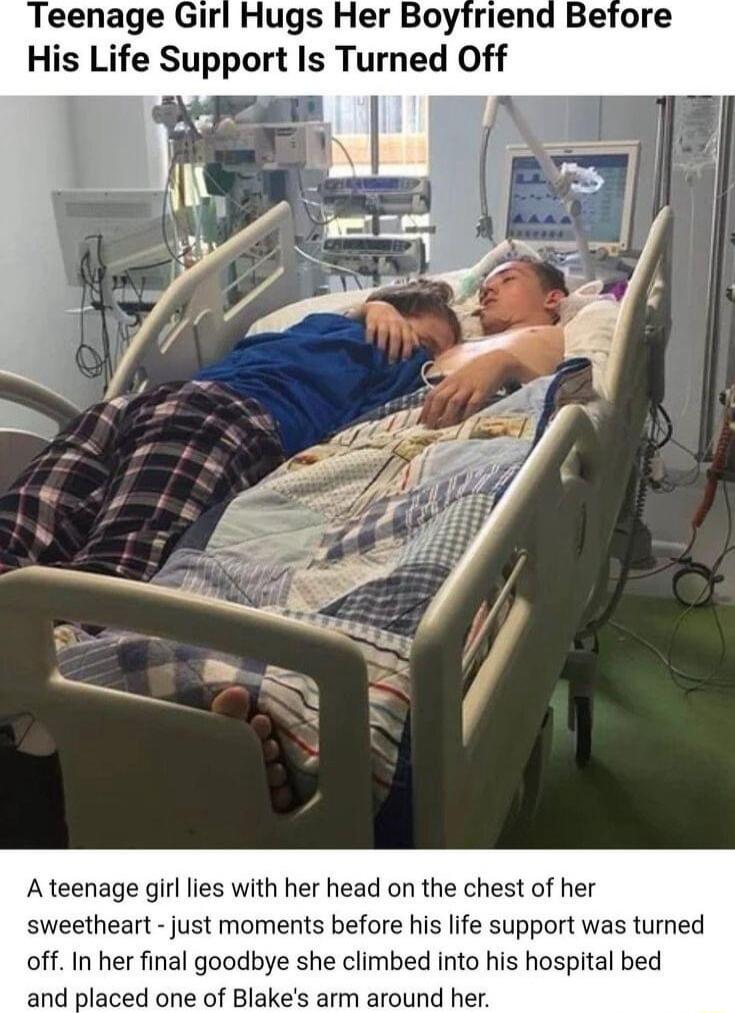 Ateenage girl lies with her head on the chest of her sweetheart just moments before his life support was tumed off In her final goodbye she climbed nto his hospital bed and placed one of Blakes arm around her