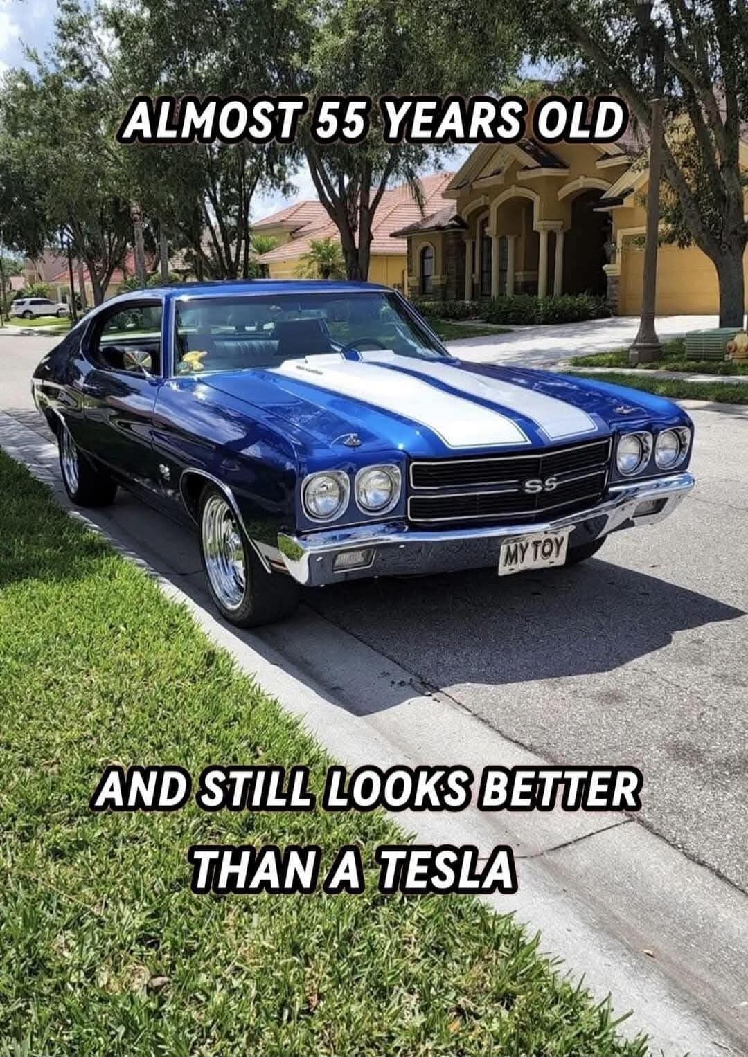 ALMOST 55 YEARS OLD AND STILL LOOKS BETTER THAN A TESLA. License plate: MY TOY.