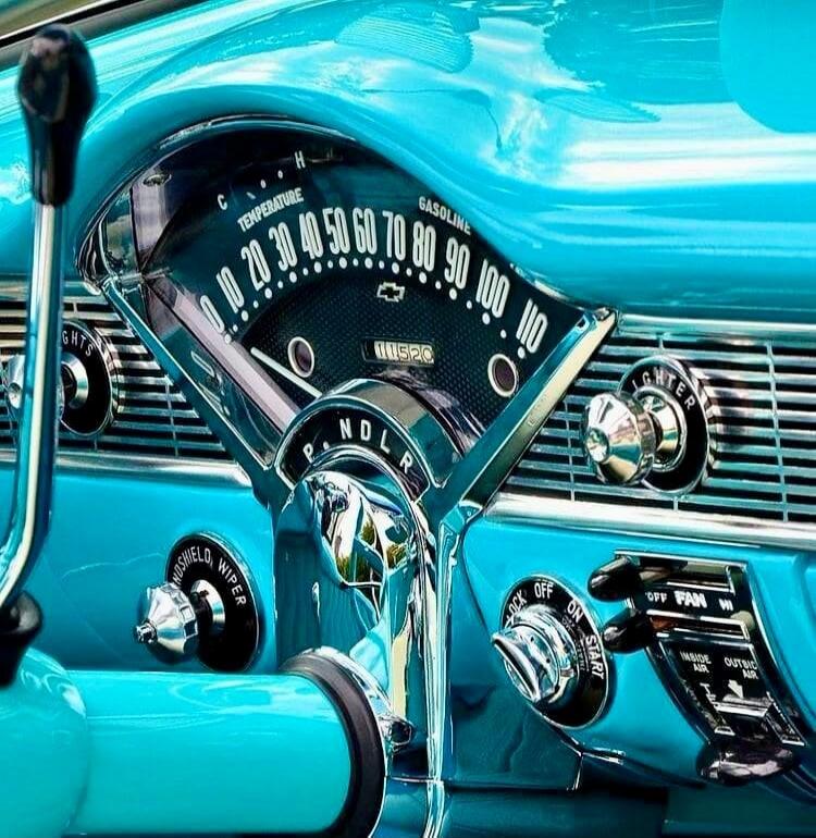 Dashboard of a vintage car, likely a Chevrolet, with gauges for temperature and gasoline, a speedometer showing numbers from 0 to 110, an odometer displaying 11520, and a gear selector with P, N, D, L, R. Various controls are visible including windshield wiper, lighter, ignition (off, on, start), and fan controls (off, fan, hi, inside, outside air)