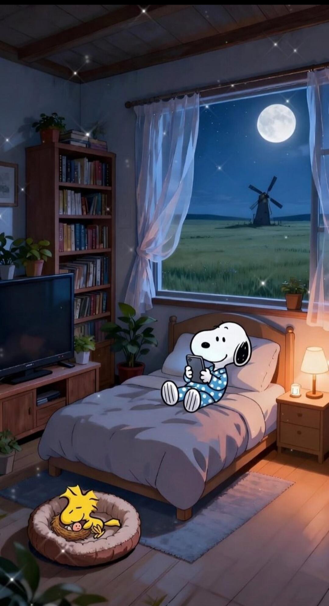 Snoopy in blue polka-dot pajamas sitting on a bed, looking at a smartphone. Woodstock is sleeping in a dog bed on the floor. A cozy bedroom at night with a full moon, stars, a field, and a windmill visible outside the window.