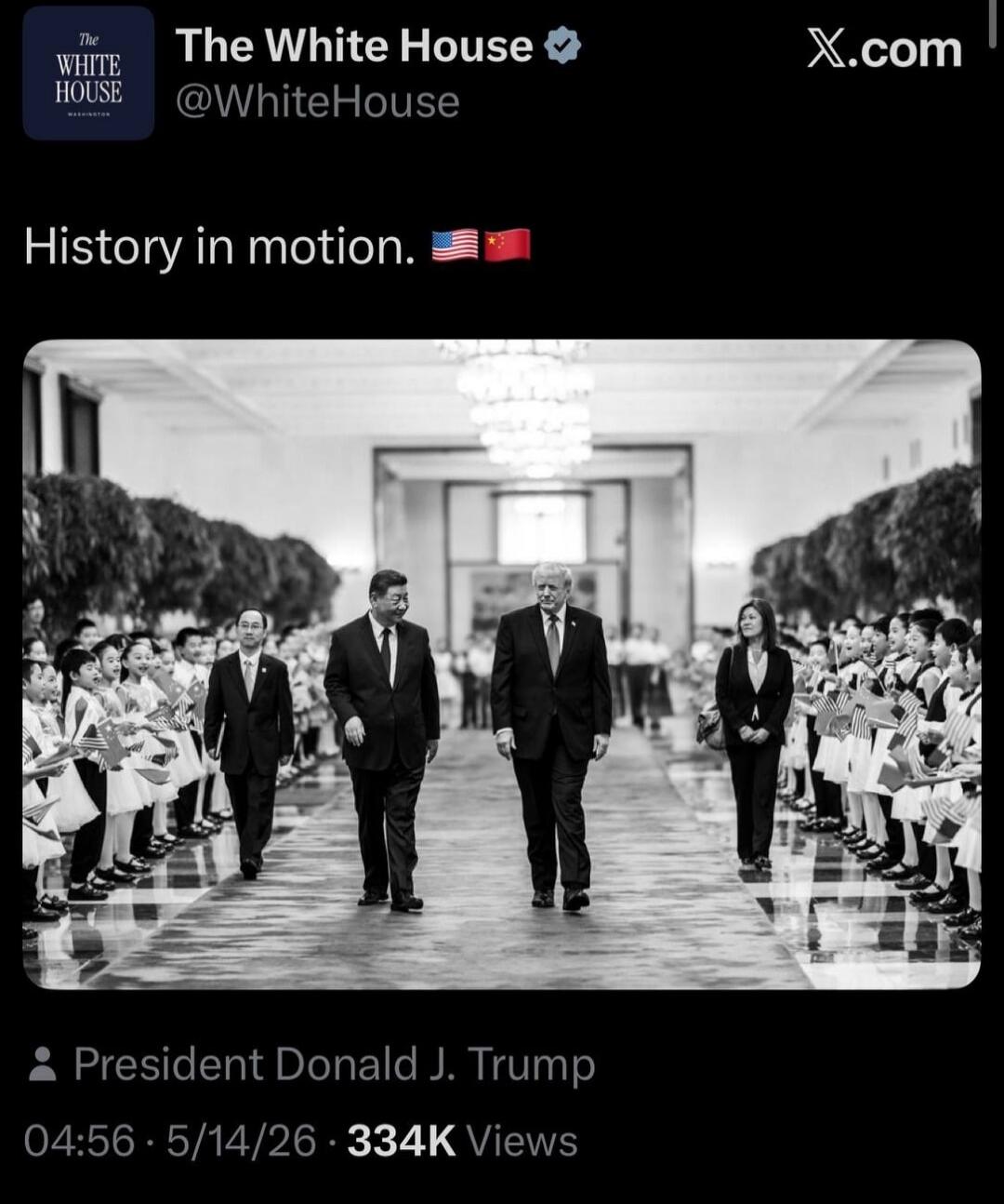 The White House @WhiteHouse X.com History in motion. President Donald J. Trump. The image shows former US President Donald Trump and Chinese President Xi Jinping walking side-by-side, with children holding US and Chinese flags lining their path. The post is from The White House account and is captioned 'History in motion.'