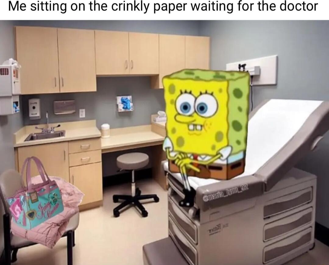 Me sitting on the crinkly paper waiting for the doctor