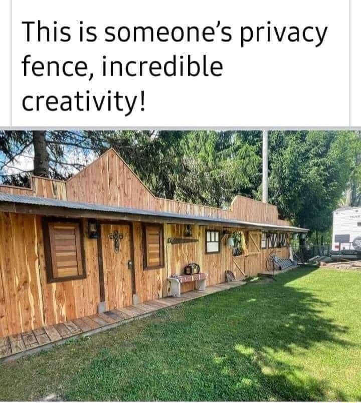 This is someones privacy fence incredible creativity