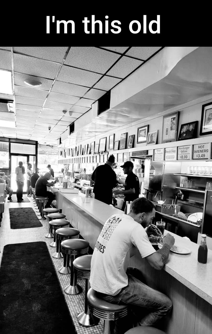I'm this old. Hamburger Deluxe $8.99. Hot Wieners $3.49.