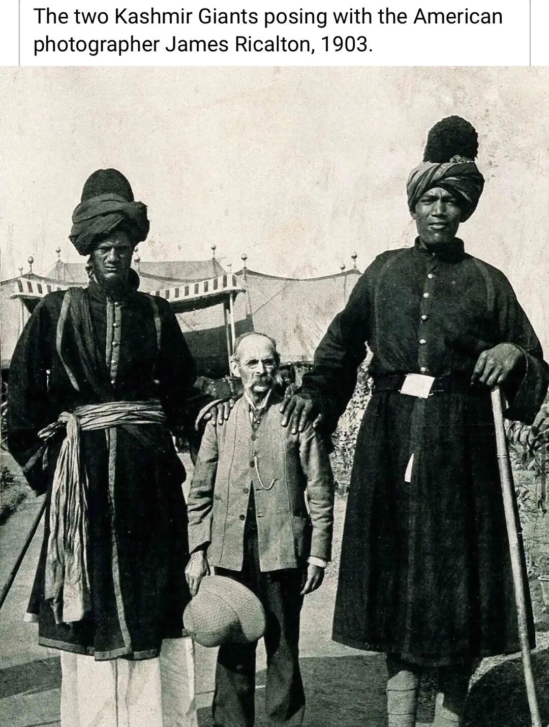 The two Kashmir Giants posing with the American photographer James Ricalton 1903