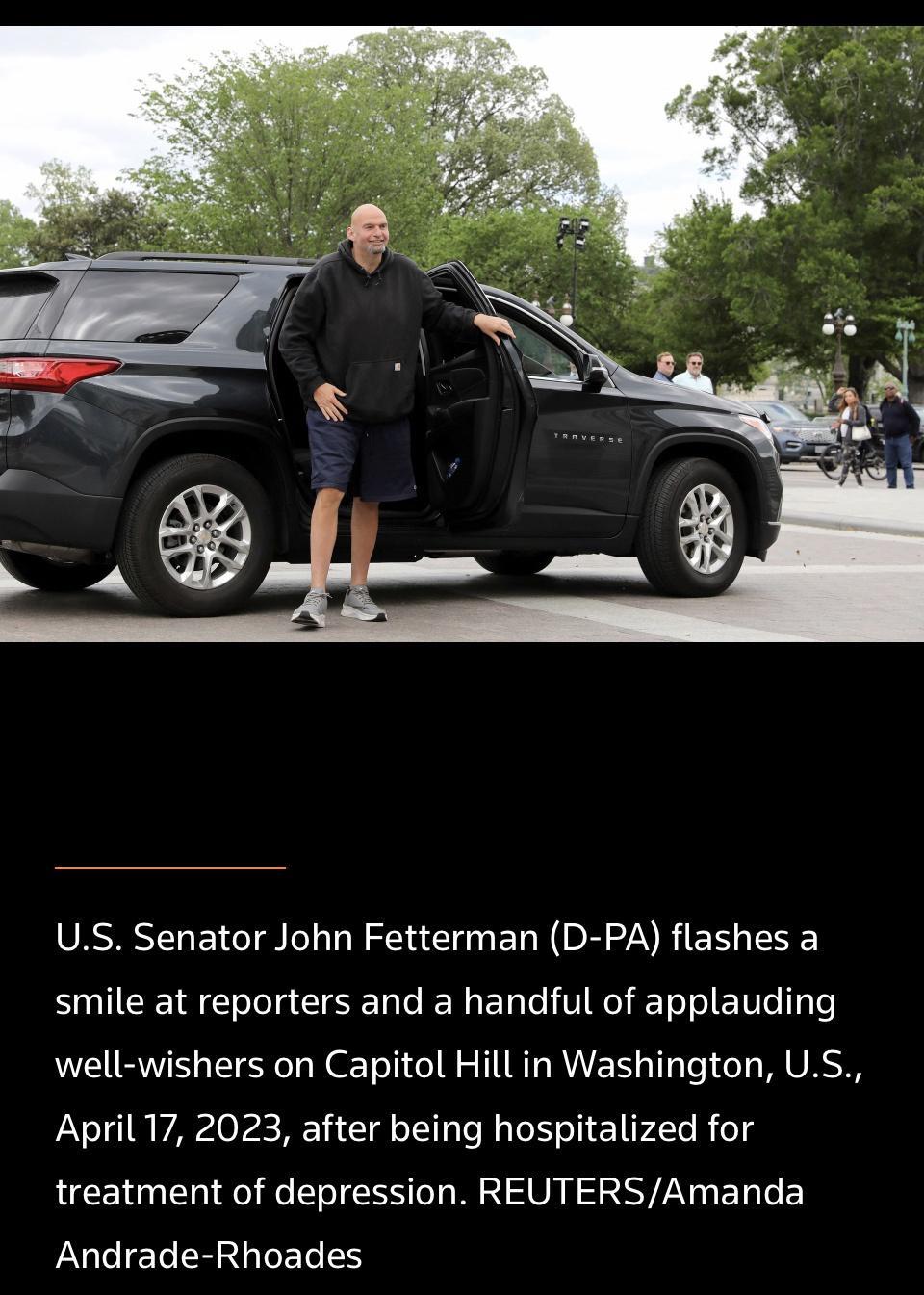US Senator John Fetterman D PA flashes a smile at reporters and a handful of applauding well wishers on Capitol Hill in Washington US April 17 2023 after being hospitalized for treatment of depression REUTERSAmanda UIELER IR ES