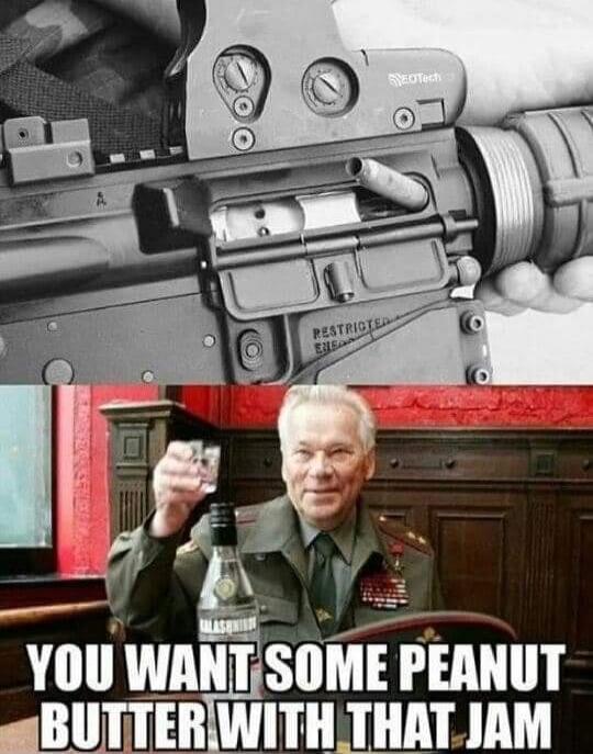 A meme featuring a close-up of an AR-15 style rifle with a stovepipe malfunction, juxtaposed with a picture of Mikhail Kalashnikov (or a similar general) holding a shot glass with a bottle of Kalashnikov vodka. The text overlay reads: 