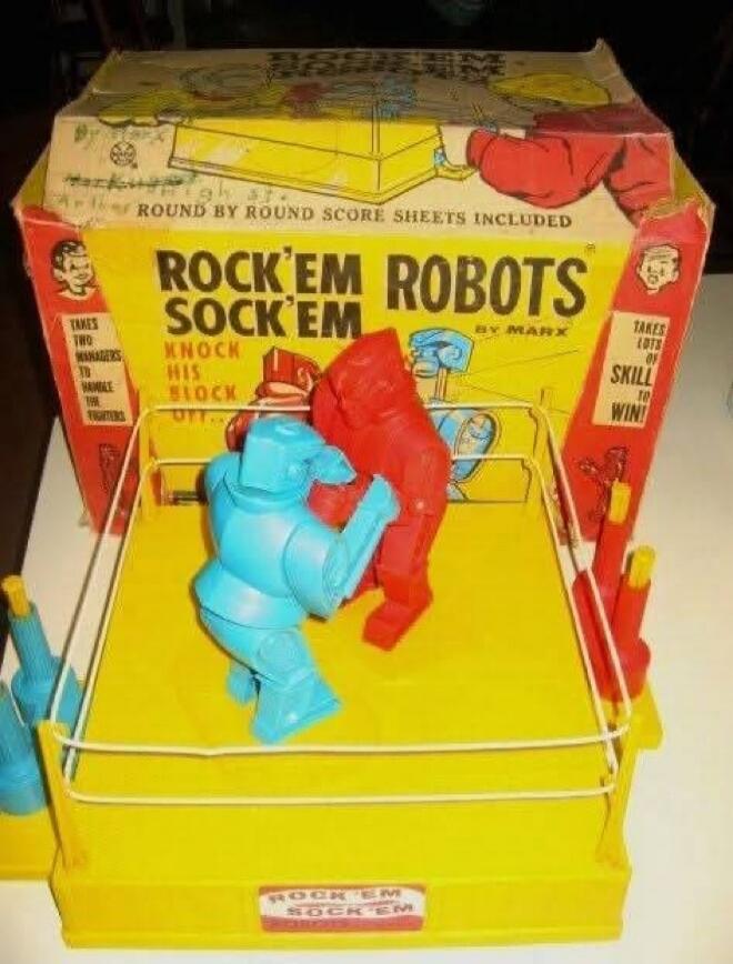 ROCK 'EM SOCK 'EM ROBOTS BY MARX. ROUND BY ROUND SCORE SHEETS INCLUDED. TAKES TWO MANAGERS TO HANDLE THE FIGHTERS. KNOCK HIS BLOCK OFF... TAKES LOTS OF SKILL TO WIN! Rock 'Em Sock 'Em.