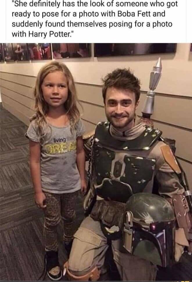 She definitely has the look of someone who got ready to pose for a photo with Boba Fett and suddenly found themselves posing for a photo with Harry Potter