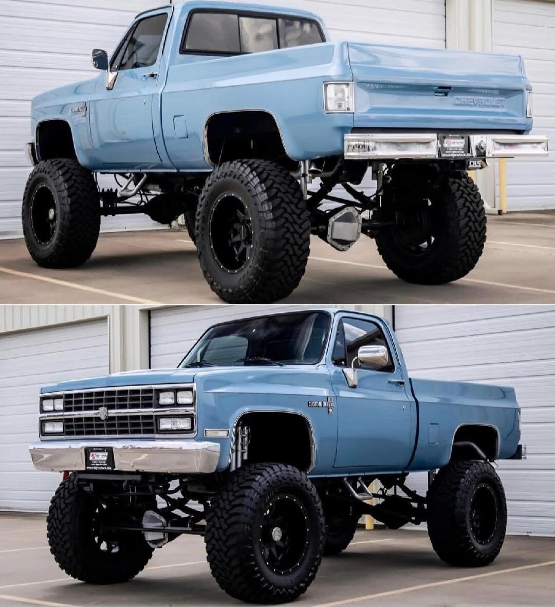 Blue lifted vintage Chevrolet pickup truck.