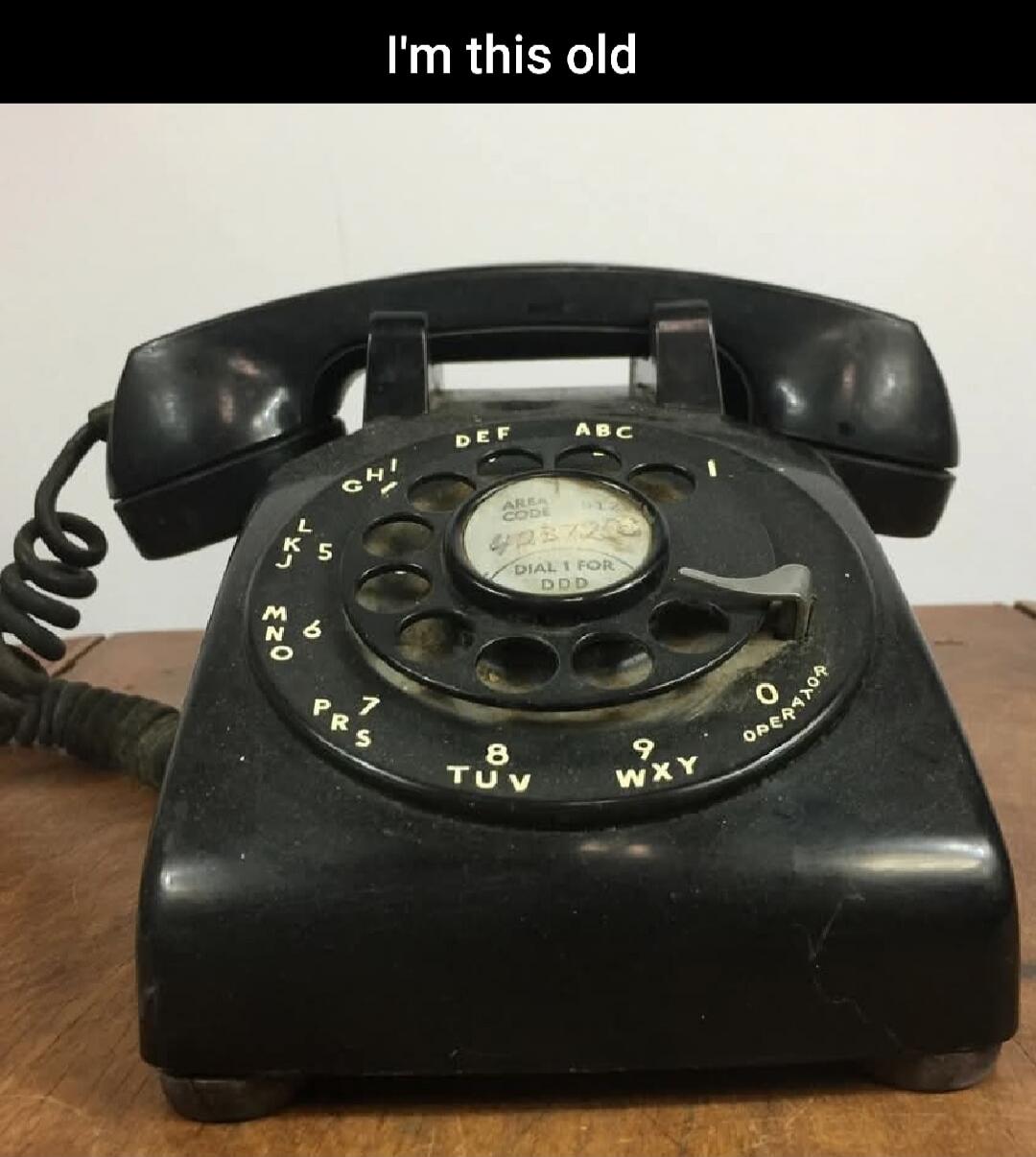 I'm this old. ABC DEF GHI JKL MNO PRS TUV WXY OPERATOR AREA CODE DIAL 1 FOR DDD