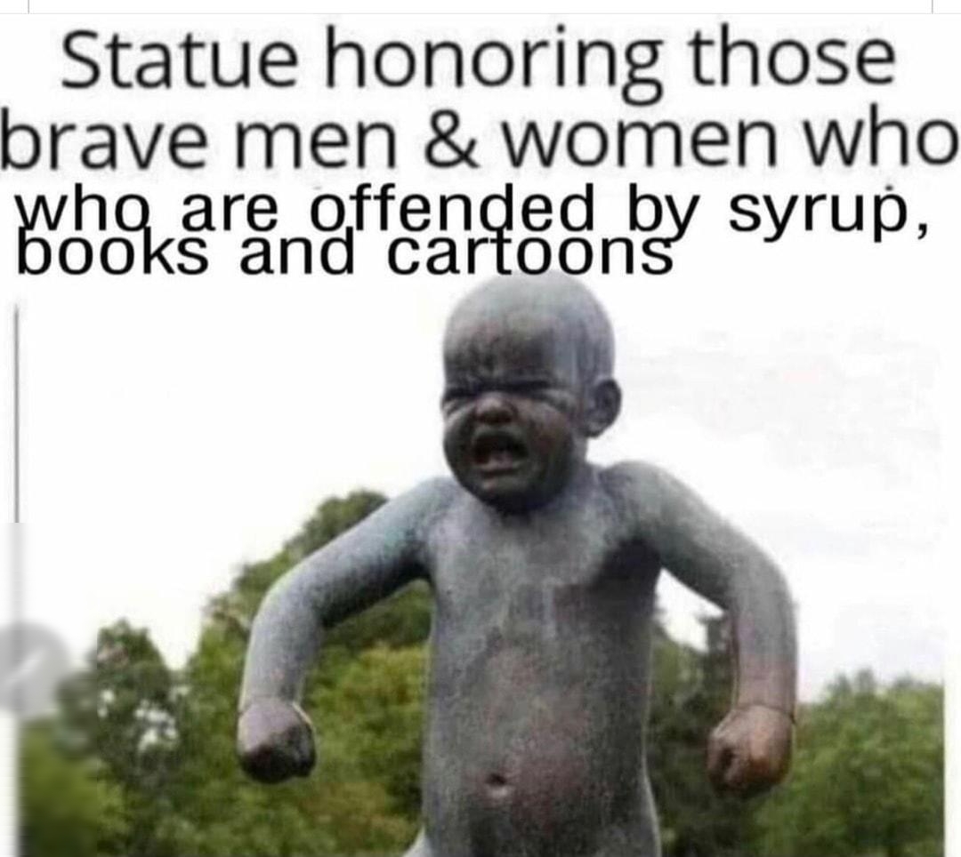 Statue honoring those brave men women who B0 Rdgg Ry syrup