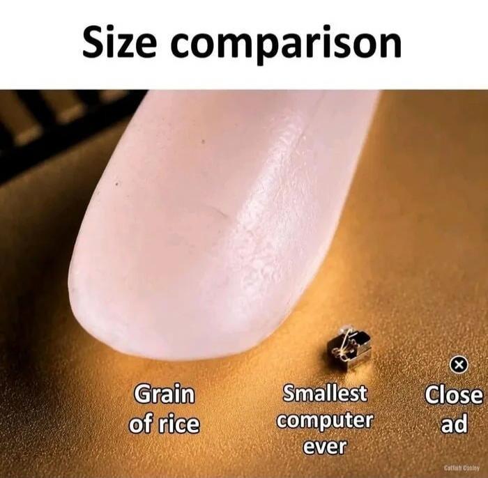 Size comparison Grain of rice Smallest computer ever Close ad