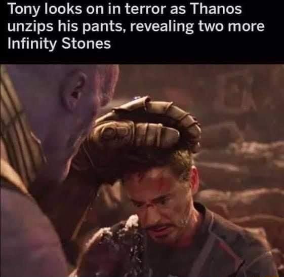 Tony looks on in terror as Thanos unzips his pants revealing two more Infinity Stones L I m AR f P A P b e 3