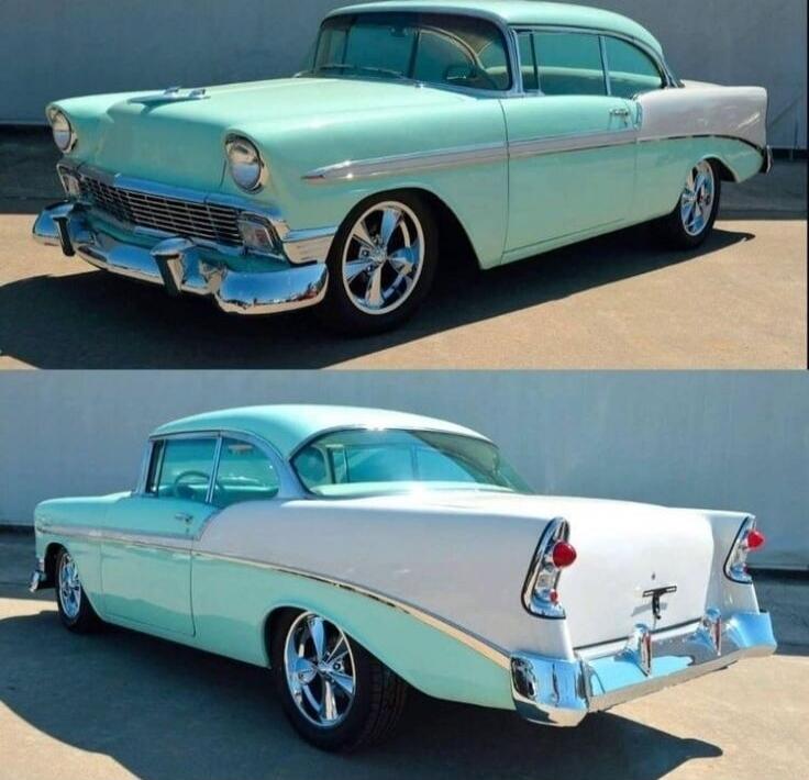 A teal and white vintage car, two-tone classic design.