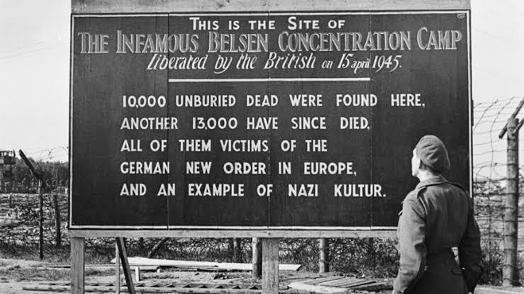Ti E SITE OF 5 THE INEAMOUS BELSEN CONCENTRATION CAMP Lbeiated by lhe Britist a 5 lgh5 10000 UNBURIED DEAD WERE FOUND HERE i o1 12 G k XoTo o B VT 1 o300 ALL OF THEM VICTIMS OF THE GERMAN NEW ORDER IN EUROPE AND AN EXAMPLE OF NAZI KULTUR