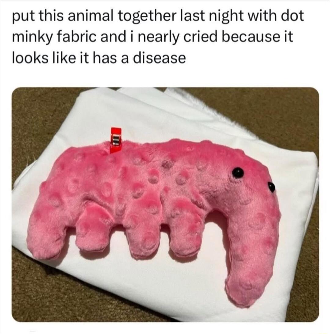 put this animal together last night with dot minky fabric and i nearly cried because it looks like it has a disease