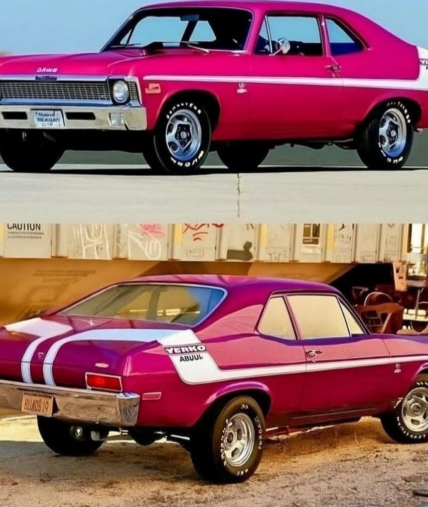 Two pink vintage muscle cars parked outdoors, one in the foreground and another in the background.