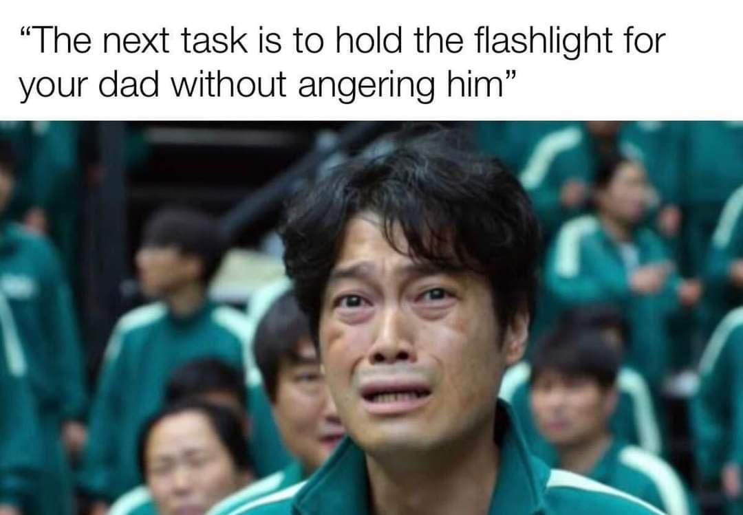 The next task is to hold the flashlight for your dad without angering him