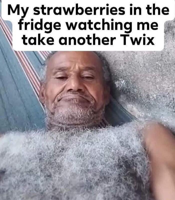 My strawberries in the fridge watching me take another Twix