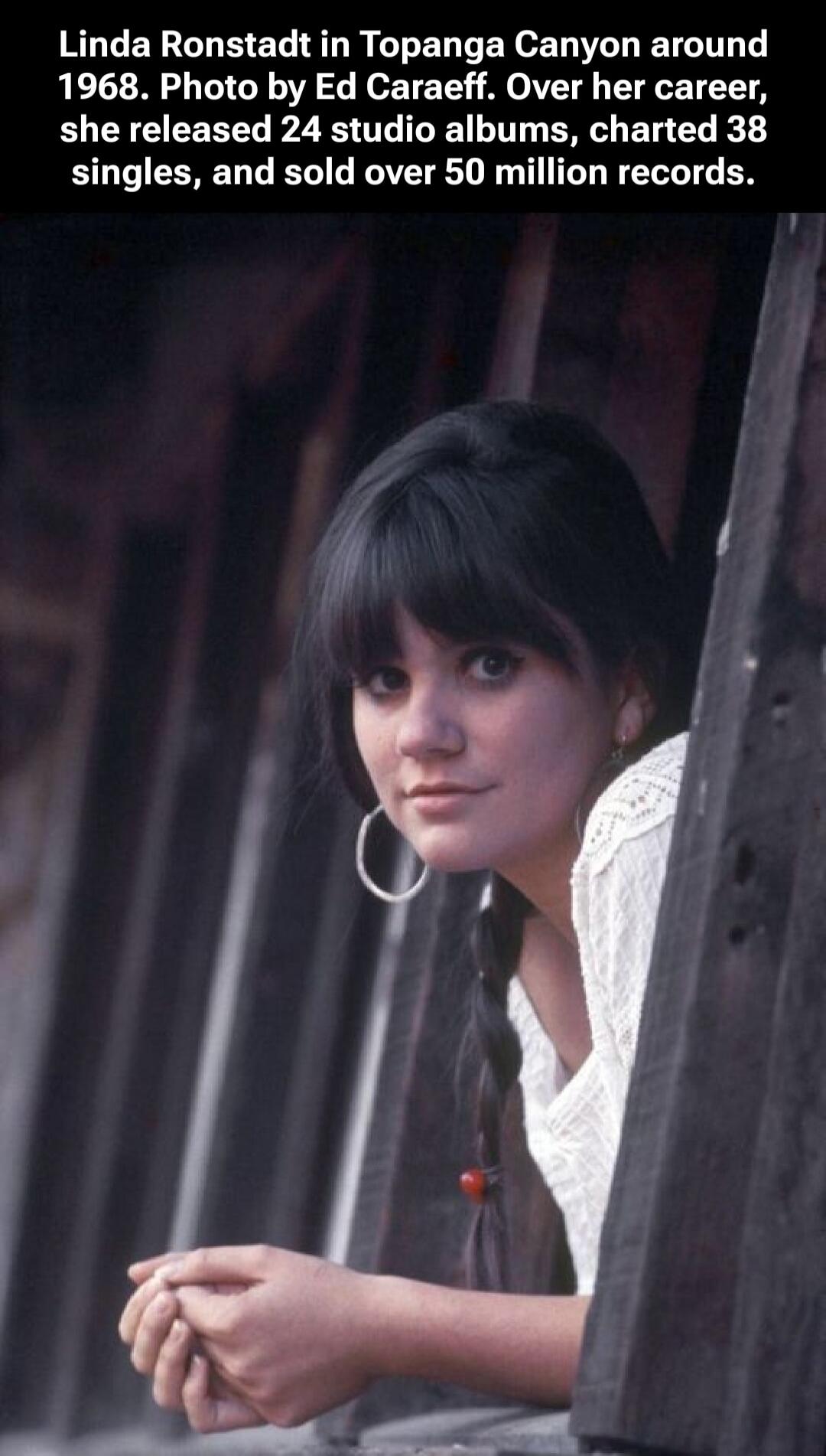 Linda Ronstadt in Topanga Canyon around 1968. Photo by Ed Caraeff. Over her career, she released 24 studio albums, charted 38 singles, and sold over 50 million records.