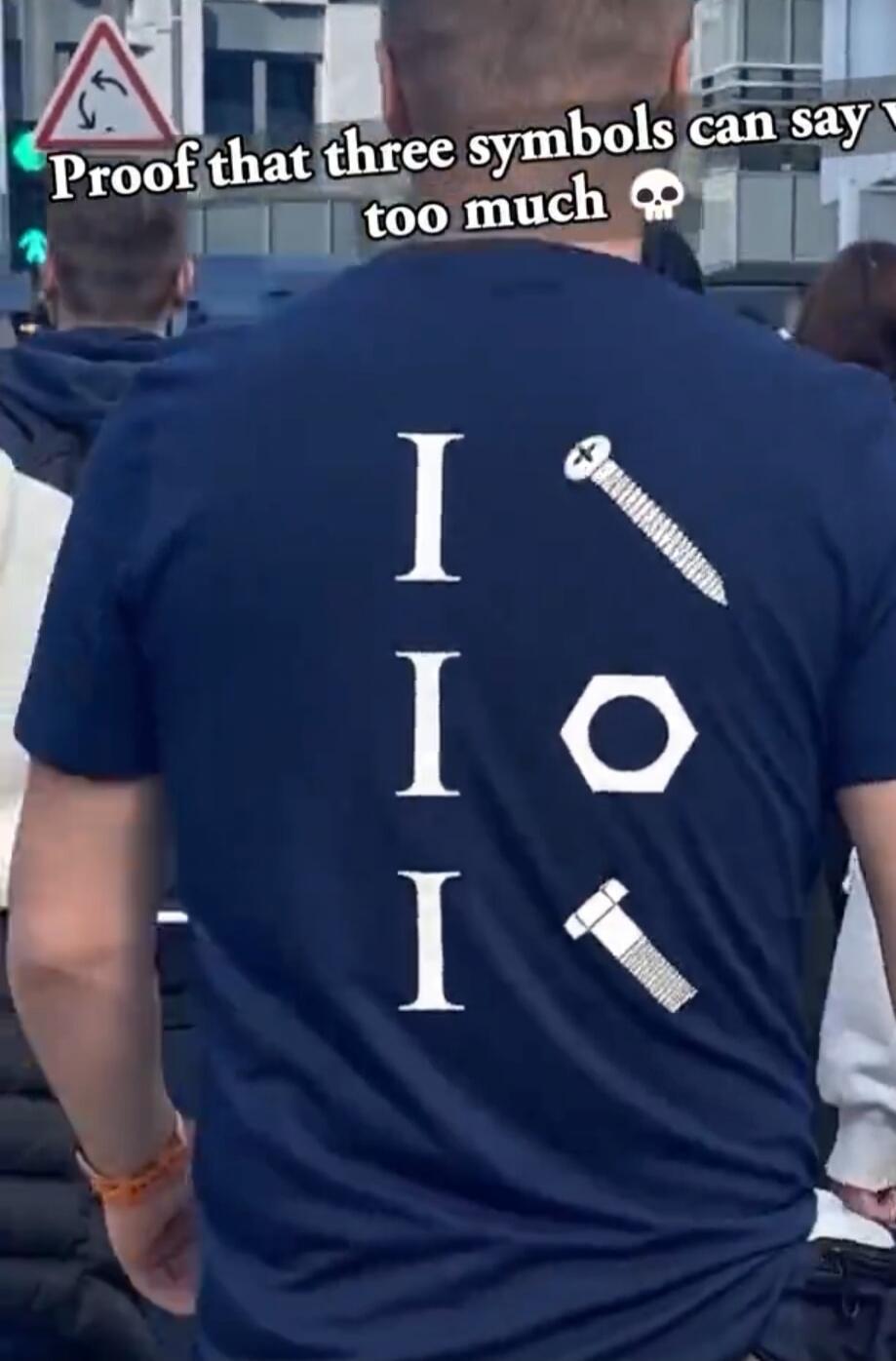 Proof that three symbols can say too much 💀. The t-shirt features a visual pun: 'I' followed by a screw, 'I' followed by a nut, and 'I' followed by a bolt, which is interpreted as a sexual innuendo.