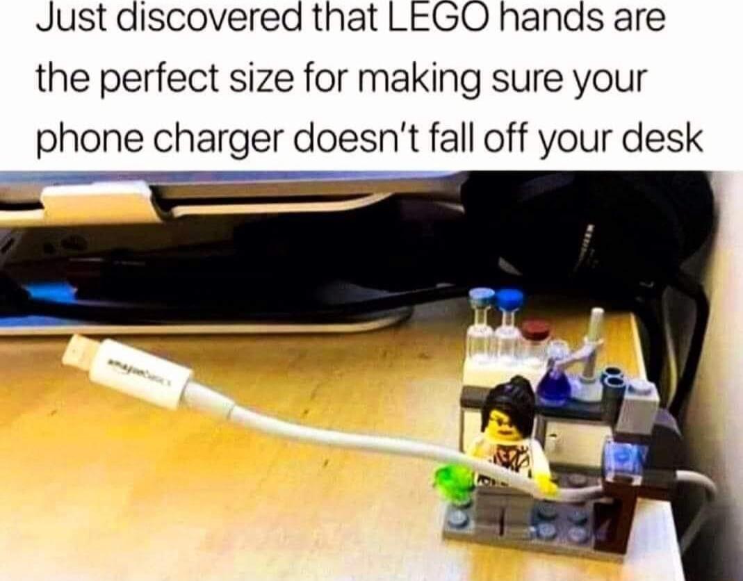 Just discovered that LEGO hands are the perfect size for making sure your phone charger doesnt fall off your desk