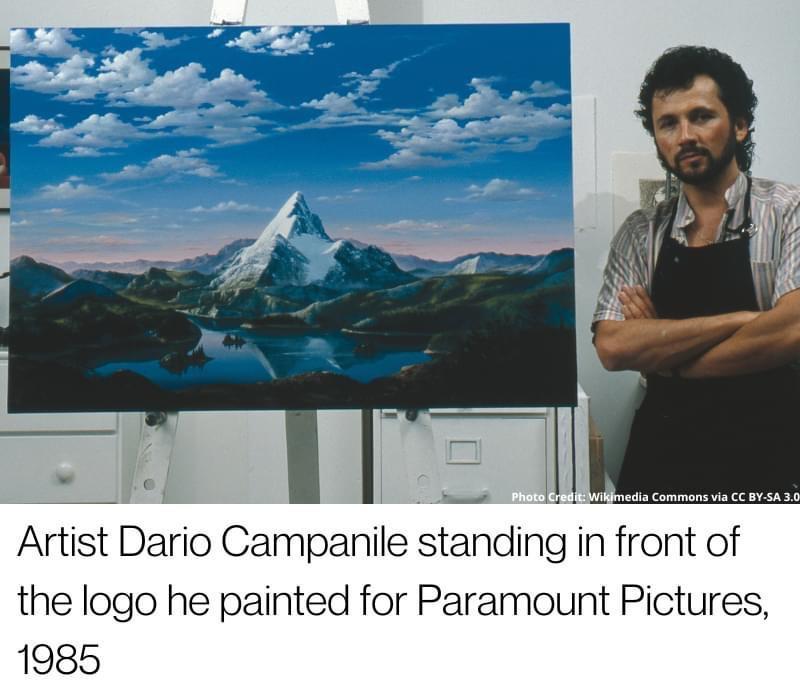 Artist Dario Campanile standing in front of the logo he painted for Paramount Pictures 1985