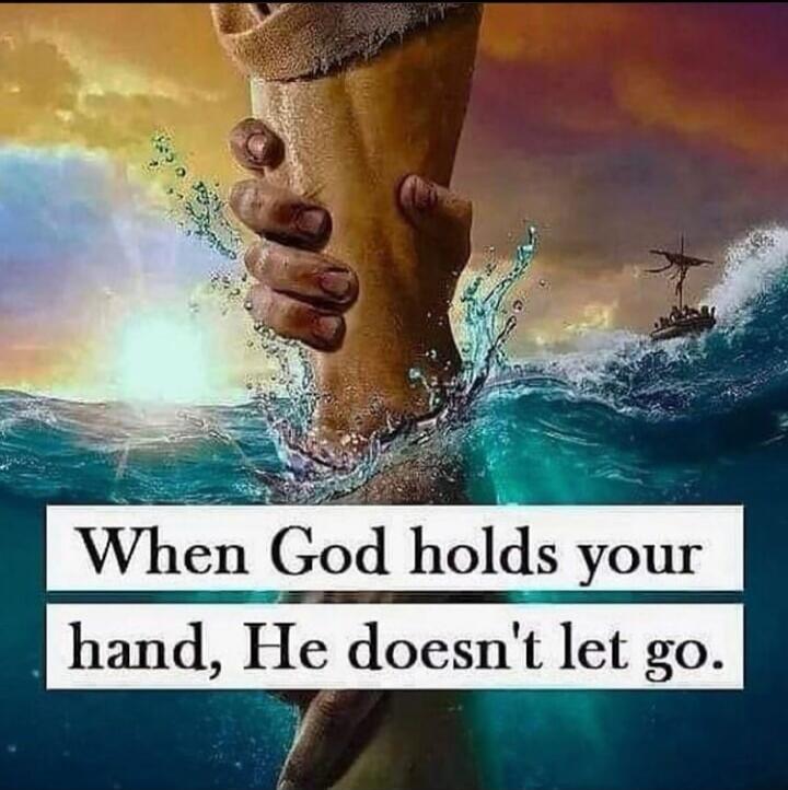 When God holds your hand, He doesn't let go.