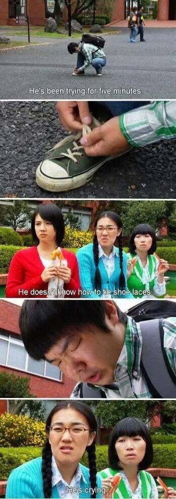 He's been trying for five minutes. He doesn't know how to tie shoe laces. He's crying.