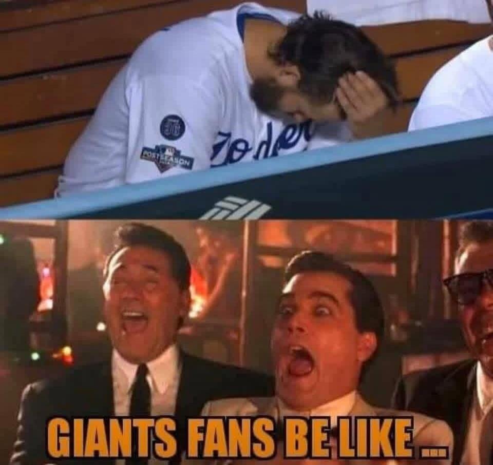 A baseball player, likely from the Dodgers, is shown dejected in the dugout with his head in his hands, wearing a jersey with 'POSTSEASON' visible. Below, three men in suits are laughing hysterically with exaggerated expressions. The text overlay reads 'GIANTS FANS BE LIKE...'