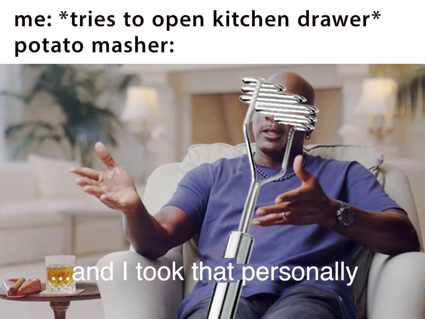 me tries to open kitchen drawer potato masher