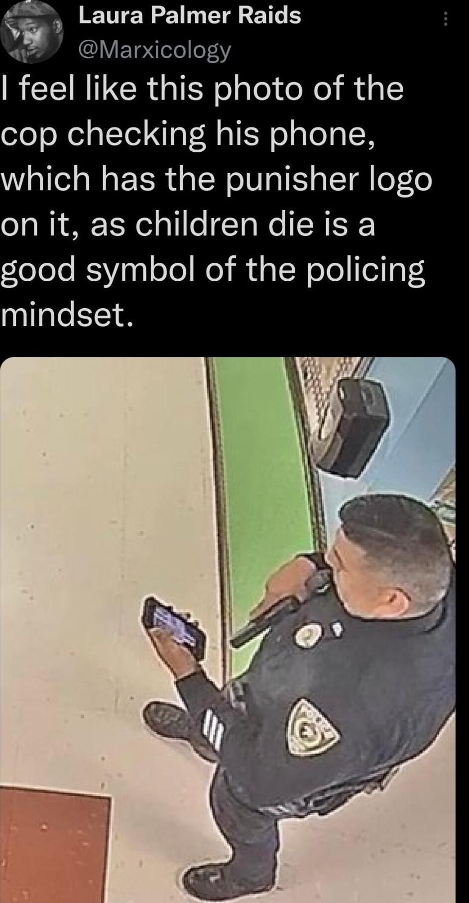 Laura Palmer Raids q Marxicology feel like this photo of the cop checking his phone which has the punisher logo on it as children die is a good symbol of the policing mindset