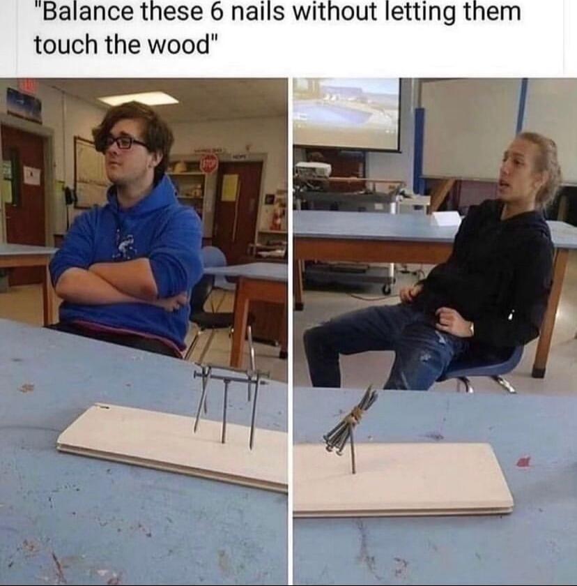 Balance these 6 nails without letting them touch the wood