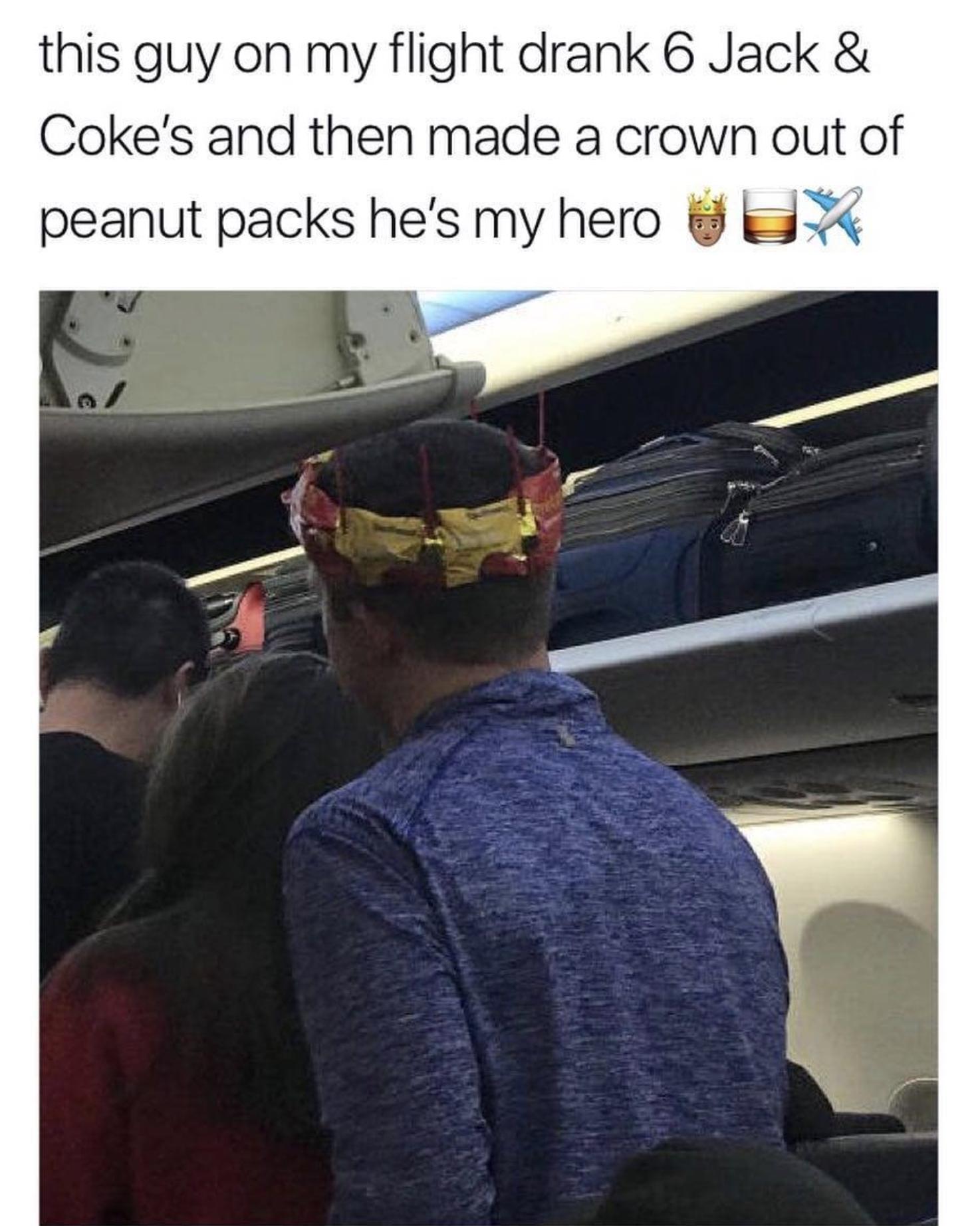 this guy on my flight drank 6 Jack Cokes and then made a crown out of peanut packs hes my hero