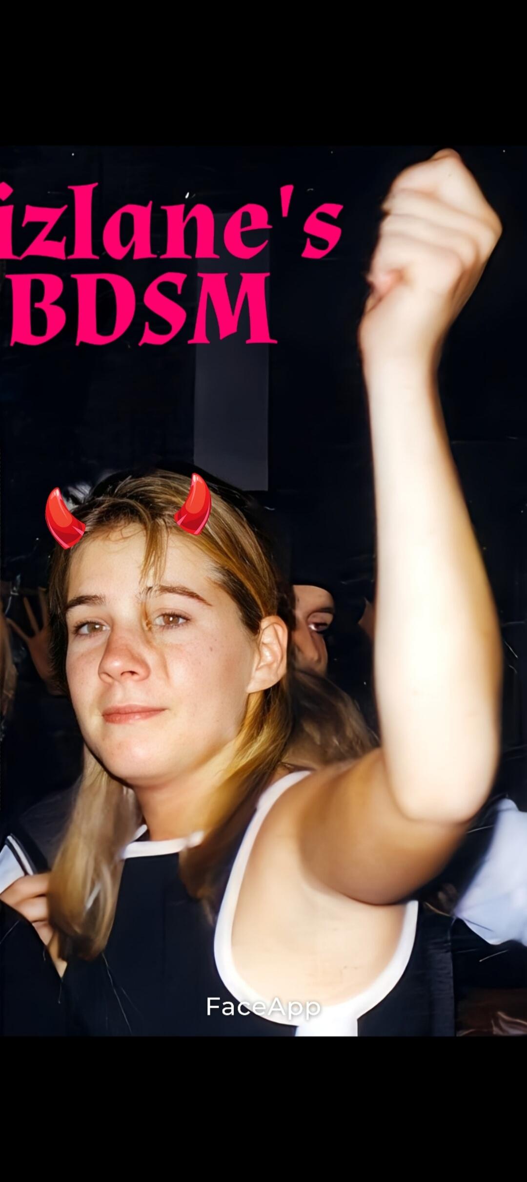 izlane's BDSM FaceApp. A young woman with devil horns and a raised fist, with text overlay 'izlane's BDSM' and 'FaceApp'.