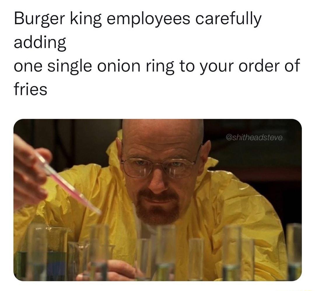 Burger king employees carefully adding one single onion ring to your order of fries