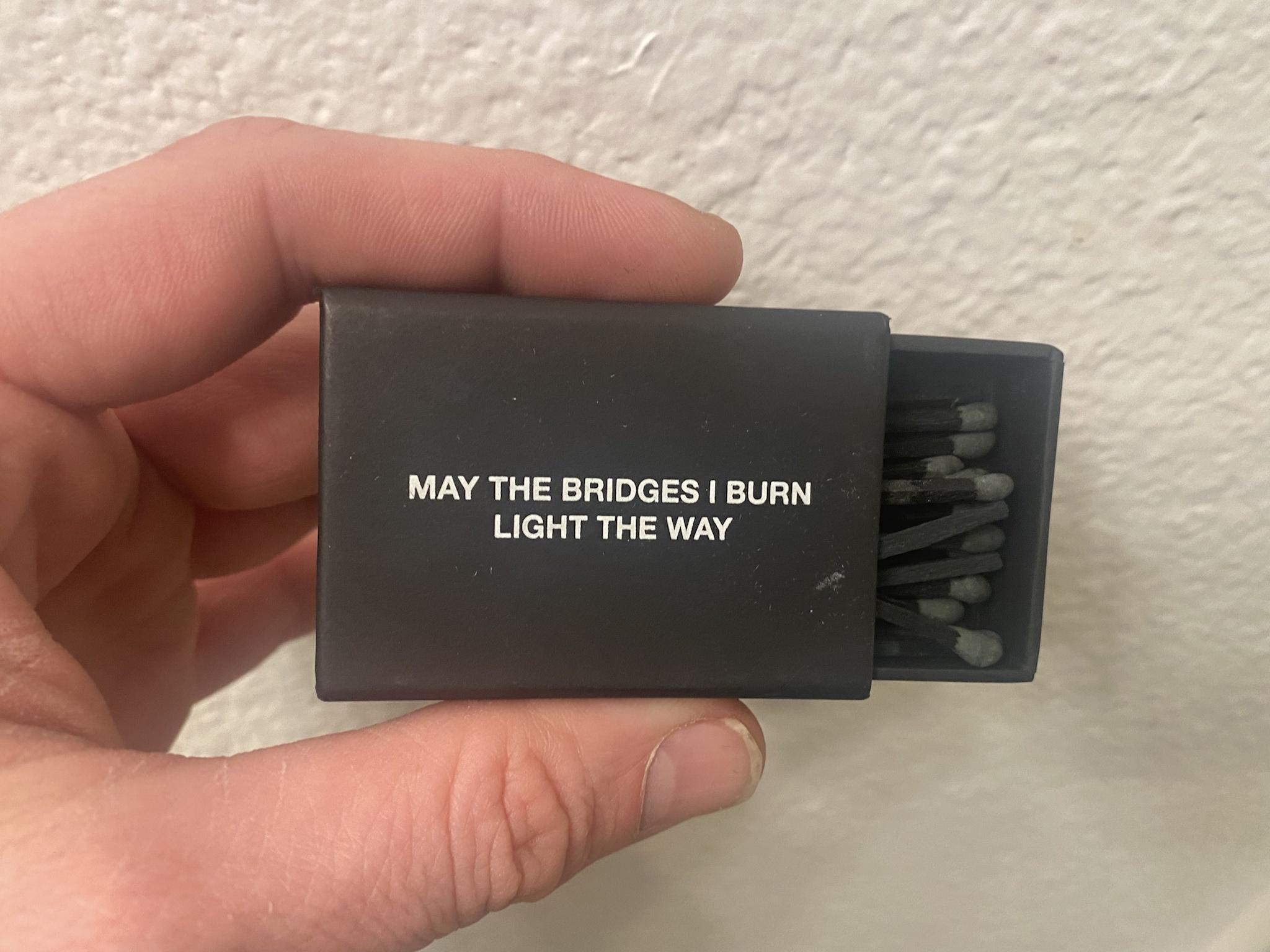 MAY THE BRIDGES BURN LIGHT THE WAY