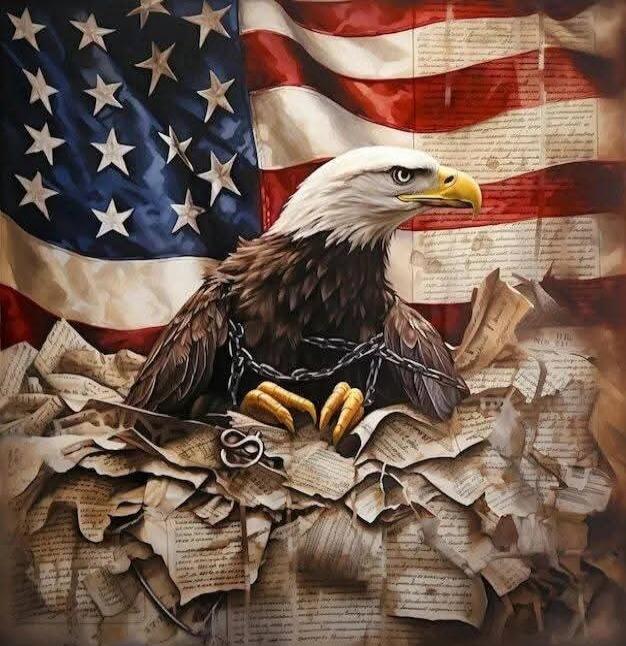 An American bald eagle with chains on its talons perched on crumpled newspaper pages, with a waving US flag in the background.