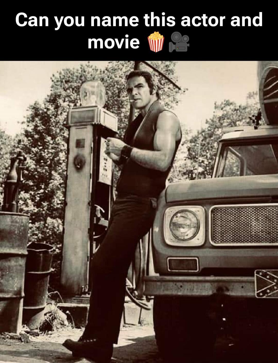 Can you name this actor and movie. A black and white photo of Burt Reynolds leaning against a truck next to a gas pump, smoking a cigarette. This scene is from the movie Smokey and the Bandit.