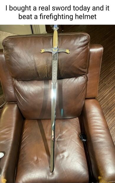 bought a real sword today and it beat a firefighting helmet