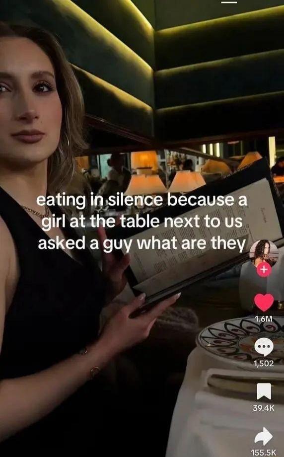 eating in silence because a girl at the table next to us asked a guy what are they